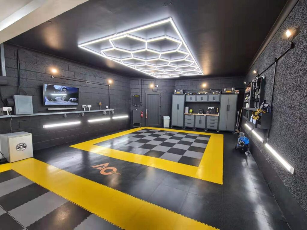 Modern Garage Enhancements Through Flooring and Lighting Innovation